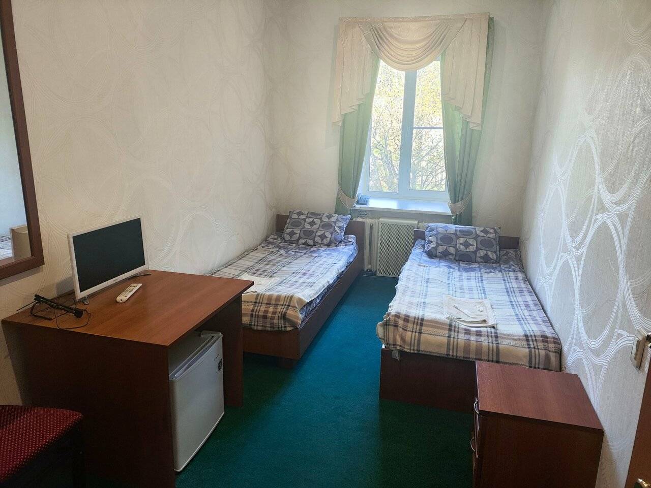 Фотографии номера Улучшенный двухместный номер с 2 отдельными кроватями в Гостинице Третьяков Кострома