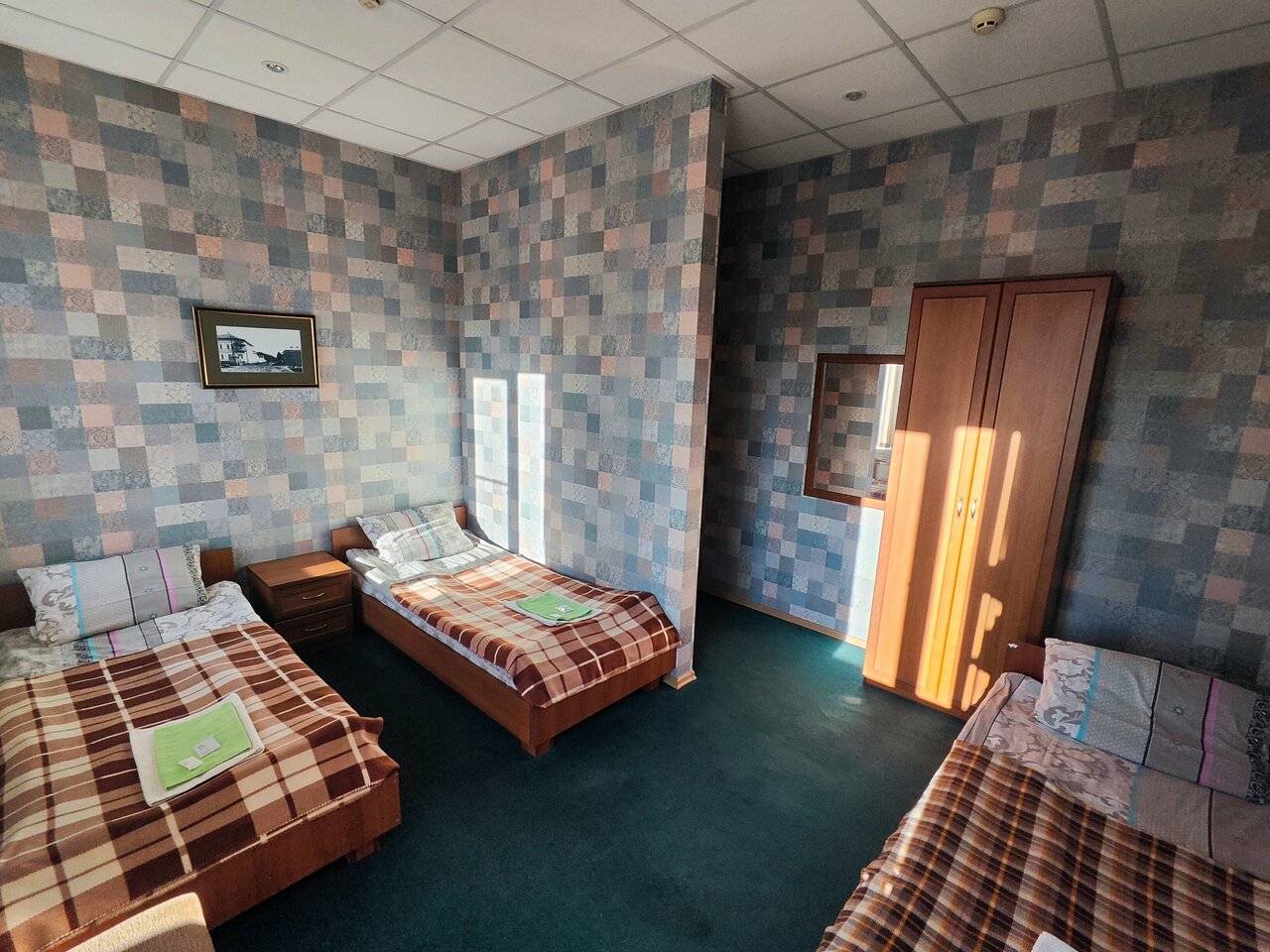 Фотографии номера Трехместный номер эконом-класса с общей ванной комнатой в Гостинице Третьяков Кострома