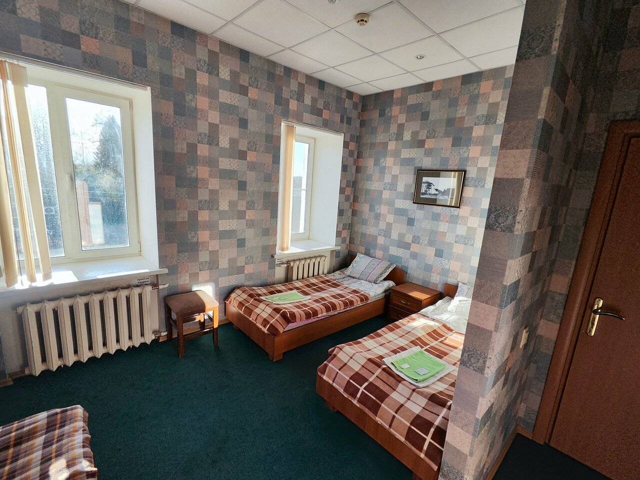 Фотографии номера Трехместный номер эконом-класса с общей ванной комнатой в Гостинице Третьяков Кострома