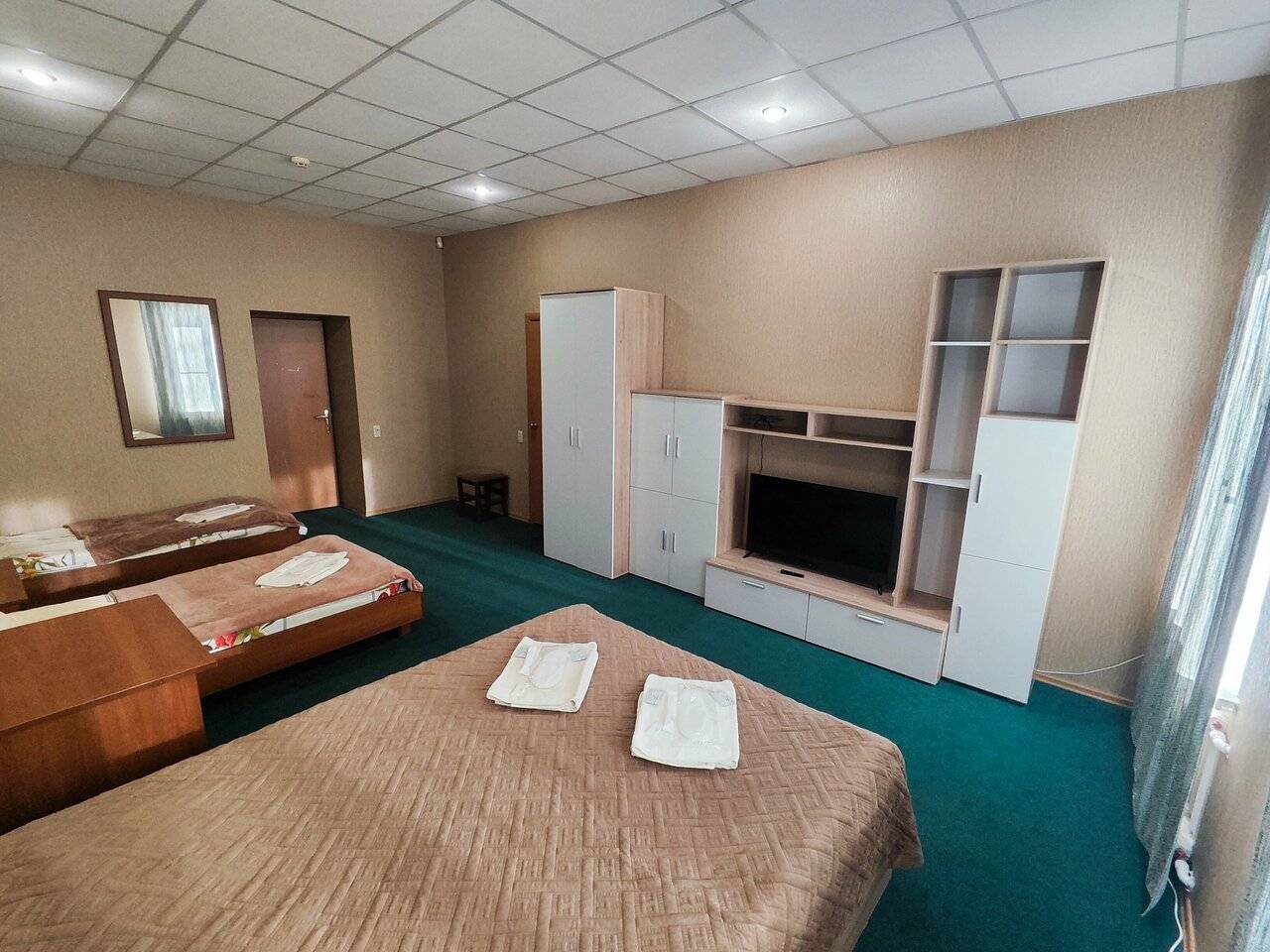 Фотографии номера Четырехместный номер Делюкс в Гостинице Третьяков Кострома