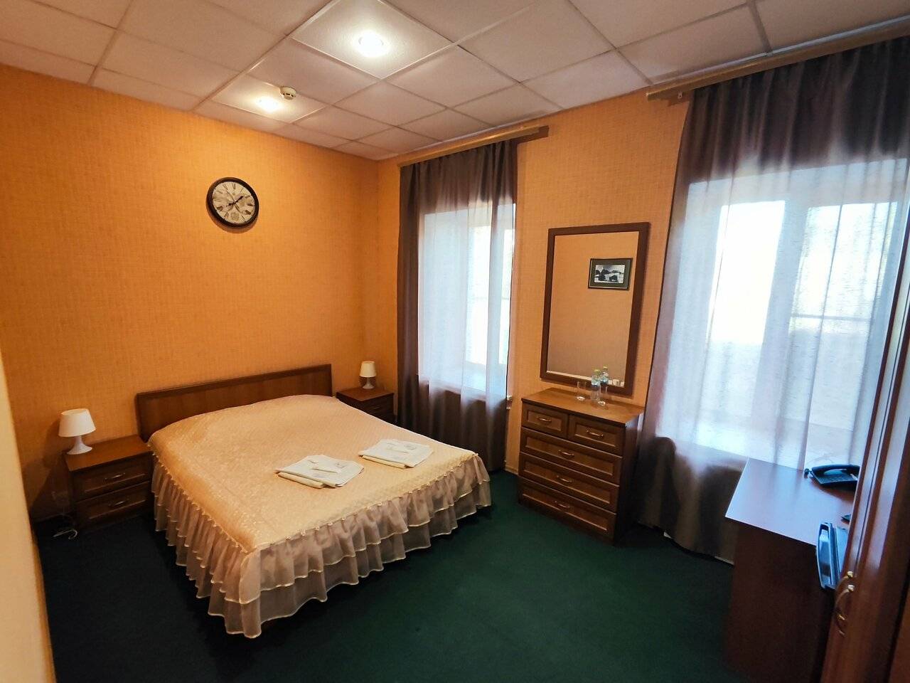 Фотографии номера Двухместный номер Делюкс с 1 кроватью в Гостинице Третьяков Кострома